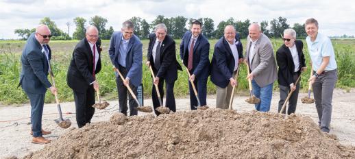 Key leaders and members shoveling dirt at water expansion groundbreaking for Craighead Technology Park South